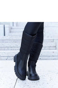 Bottes cuissardes cuir noir style moderne matelassé semelle épaisse confort hiver femmes élégantes