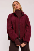 veste femme zippée tricot doux poil court bordeaux coupe boxy col montant manches ballon raglan poches latérales doublure