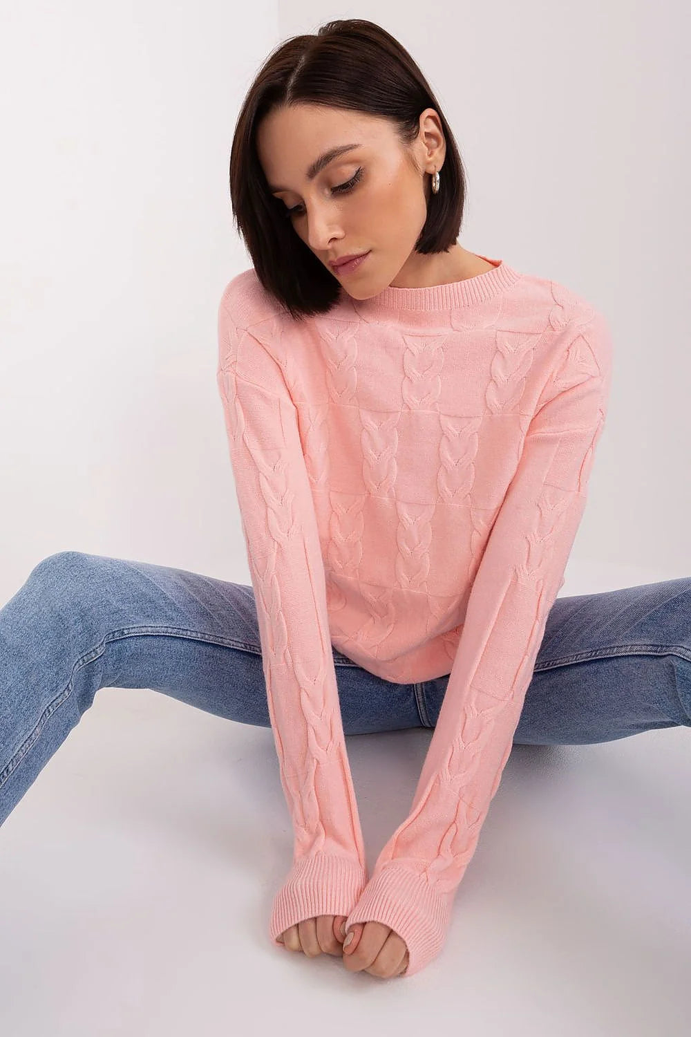 pull femme torsadé maille rose pastel col rond manches longues coupe ajustée épaules tombantes finitions poignets ourlet confort doux élégant