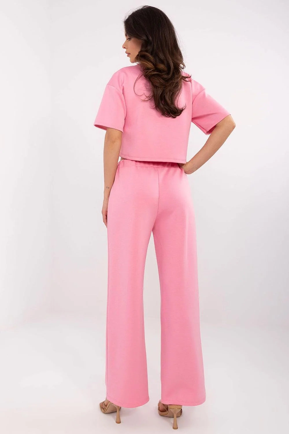 ensemble coordonné féminin rose vif maille douce taille haute pantalon large crop top boxy manches courtes ceinture élastique oversize confortable