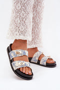 sandales plateforme brides tissu beige imprimé floral bleu détails métalliques dorés semelle caoutchouc noire antidérapante rembourrée confortable mules élégant estival