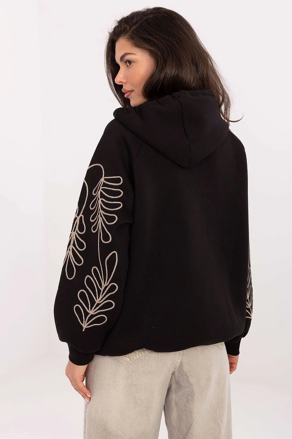 sweat capuche zippé femme oversize molleton noir poches kangourou manches bouffantes cordon serrage broderie florale beige contrastée bordscotes coton élasthanne