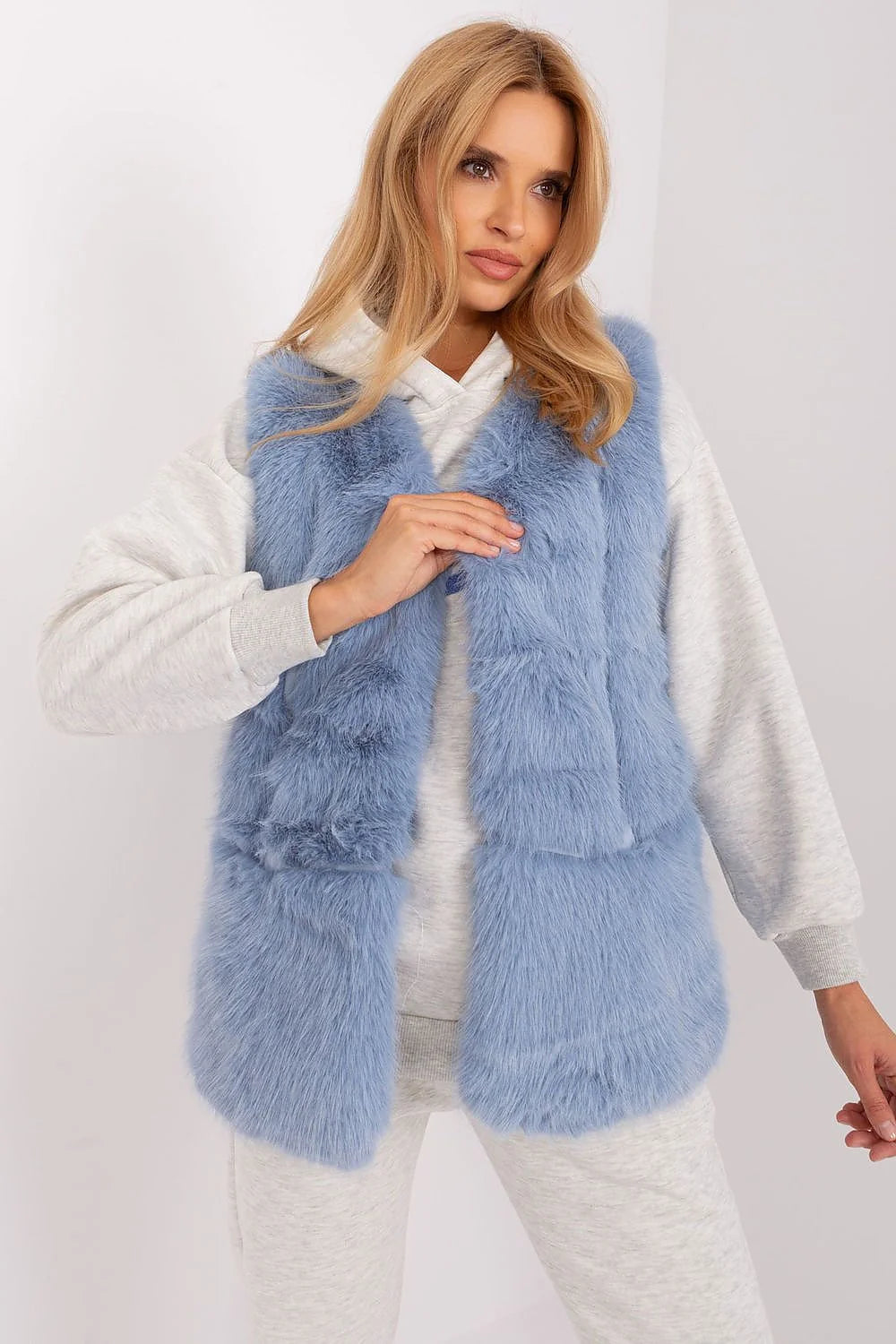 Veste sans manches en fausse fourrure moderne élégante bleu pastel longue coupe droite pour femme