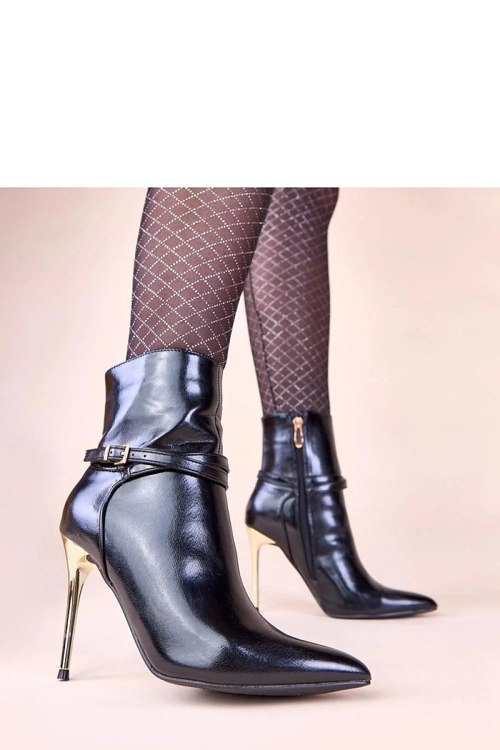 bottines noires cuir verni cheville talons aiguilles dorés bout pointu silhouette élancée fermeture éclair latérale boucle dorée semelle fine soirée