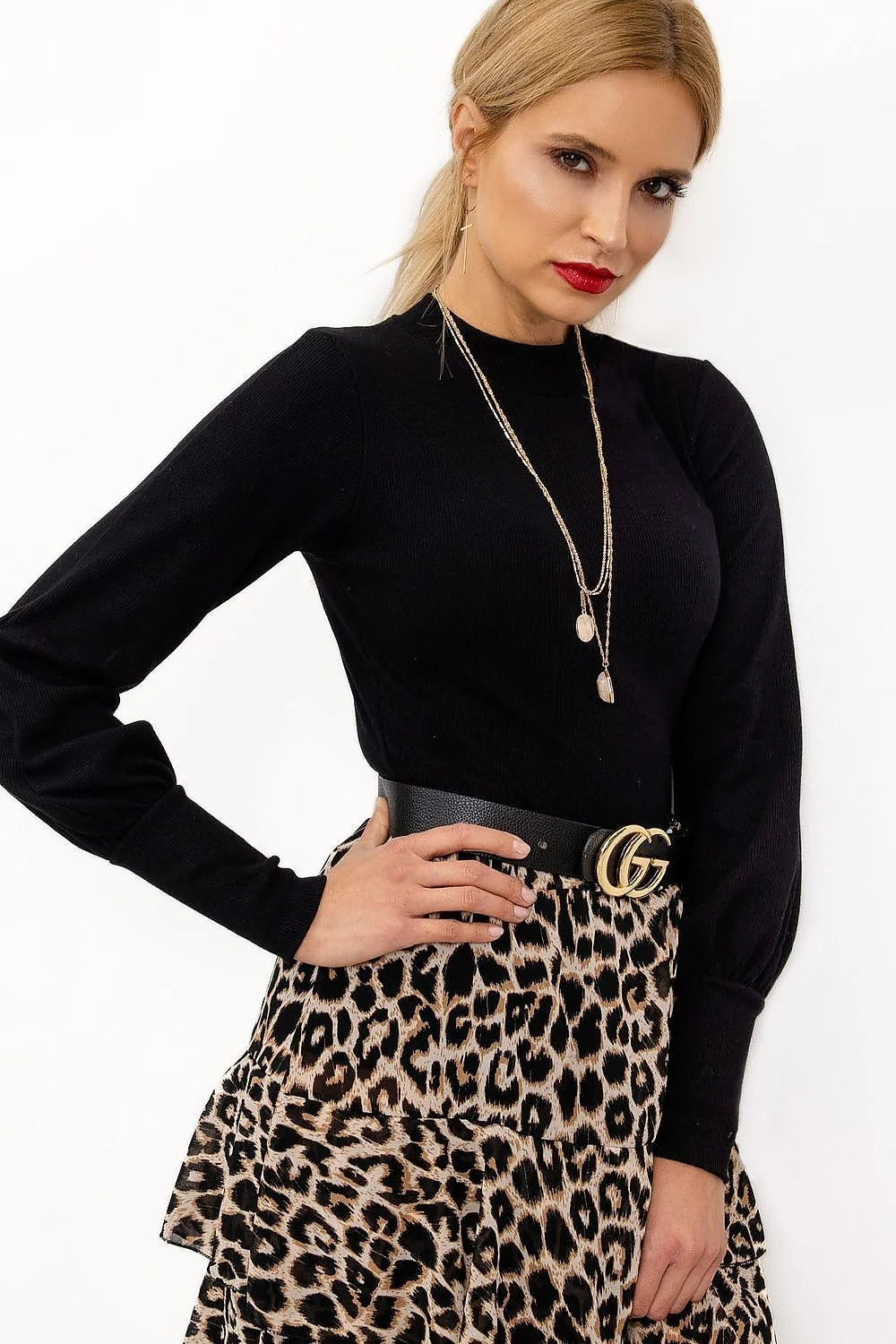 ensemble chemisier pull col montant maille fine côtelée fuchsia vif manches longues bouffantes poignets froncés haut ajusté pantalon