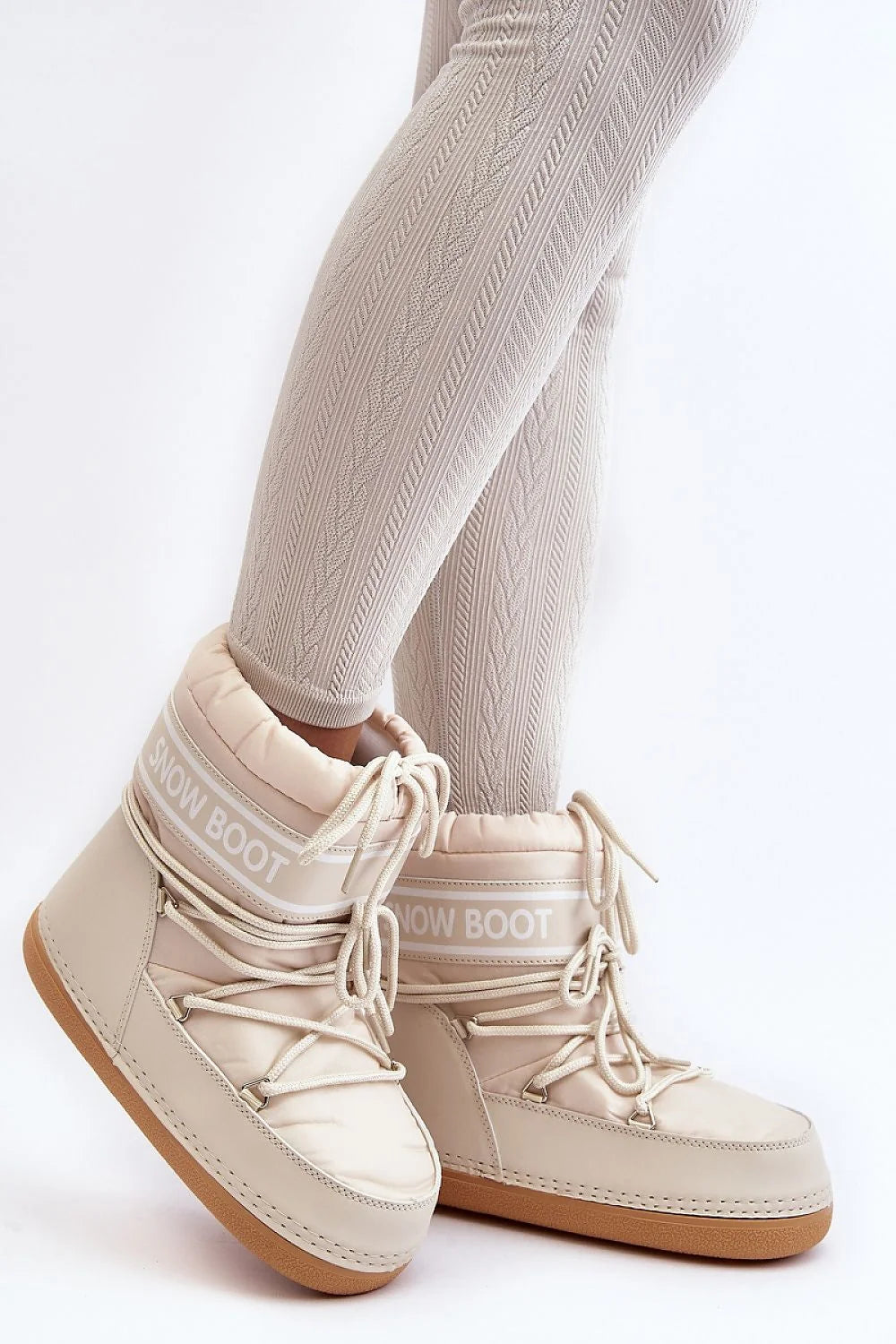 bottes neige femme douillettes confortables isolantes thermiques matelassée nylon rembourrée cuir écologique laçage ajustable bride logo cheville semelle gomme antidérapante