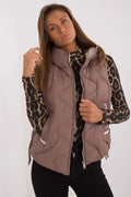 gilet matelassé sans manches doudoune femme taupe rosé coupe courte col montant rembourré polyester ondulé fermeture éclair double curseur
