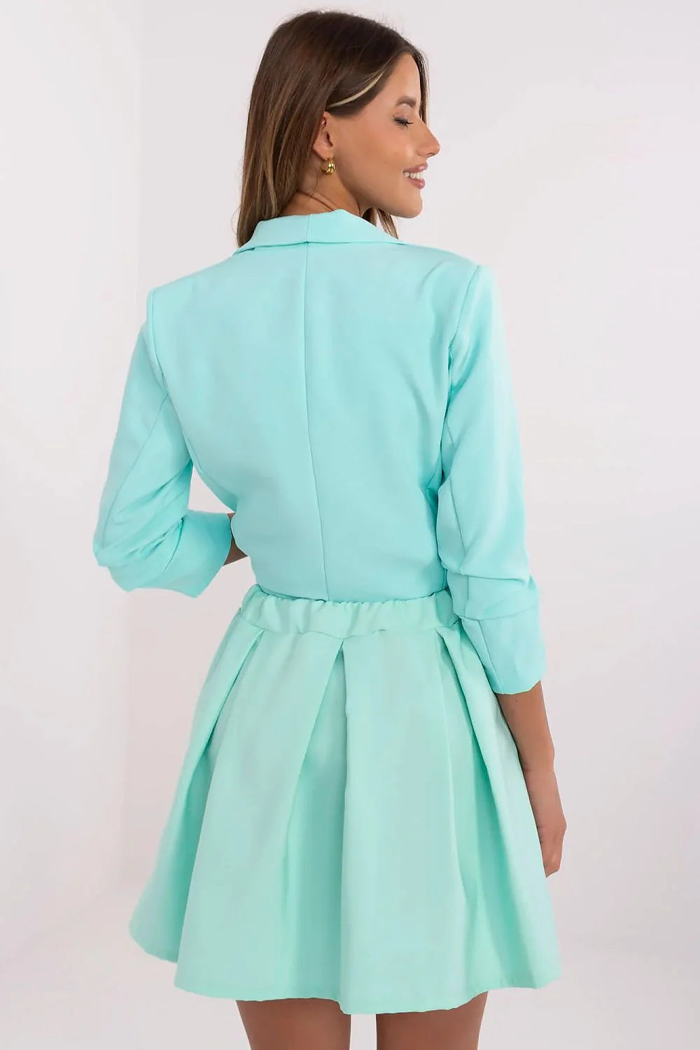 Ensemble vêtements femme blazer jupe courte haut court style moderne chic couleur turquoise matériau polyester léger taille élastique