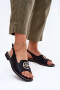Sandales femmes chic moderne cuir noir logo métallique strass doré style slingback ajustable confortable été élégant occasion