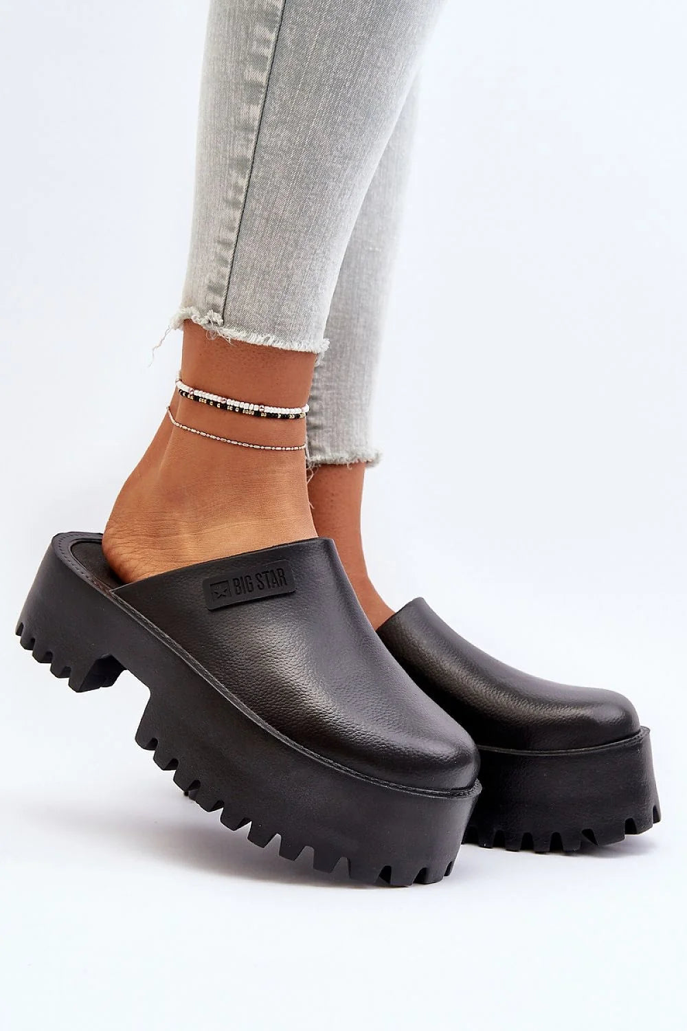 Clacquettes Step in style sabot moderne femme cuir noir plateforme épaisse semelle crantée logo subtil