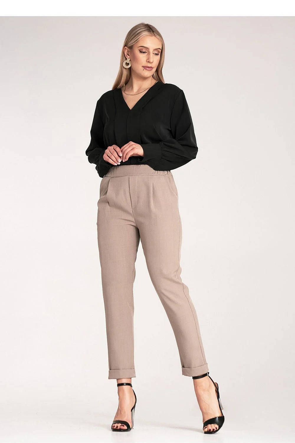 pantalon femme coupe ajustée ourlet retroussé taille haute ceinture élastique polyester elasthanne poches latérales fuselé confortable élégant moderne