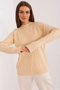 pull femme tricoté torsadé beige clair manches longues col rond bords côtes maille fine coupe droite longueur hanche douce chaude