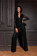 combinaison noire sequins brillante longueur maxi manches longues maille semi transparente décolleté croisé taille marquée jambes larges fluide