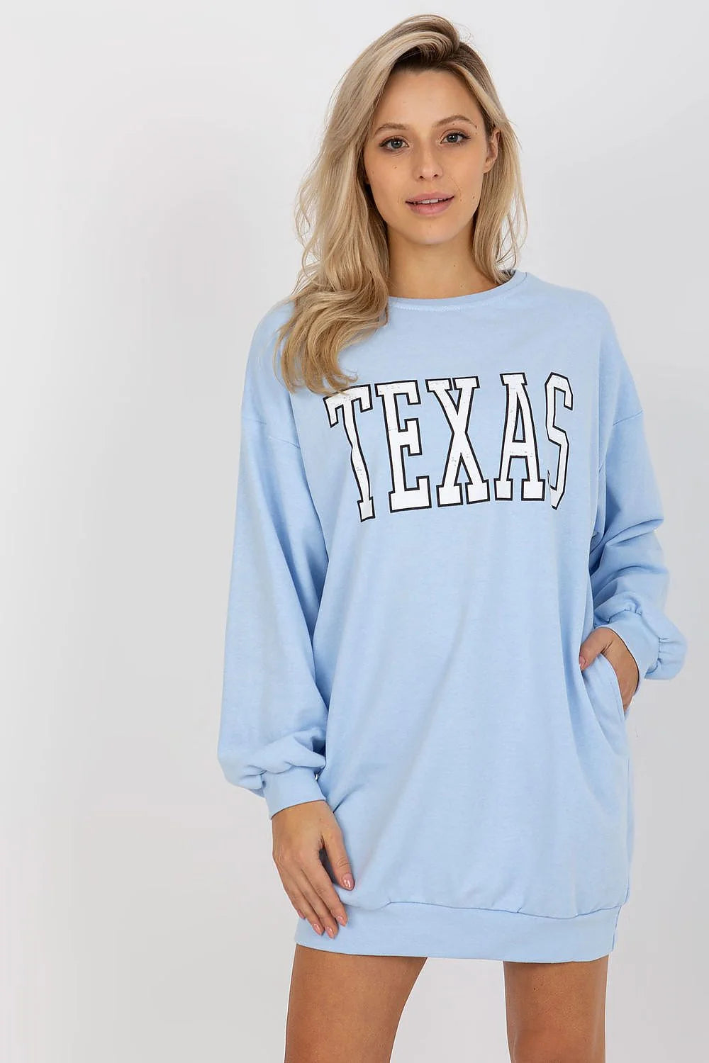 sweatshirt oversize femme long coton molletonné bleu pastel imprimé texas col rond manches longues tombantes poches latérales côtelés confort quotidien