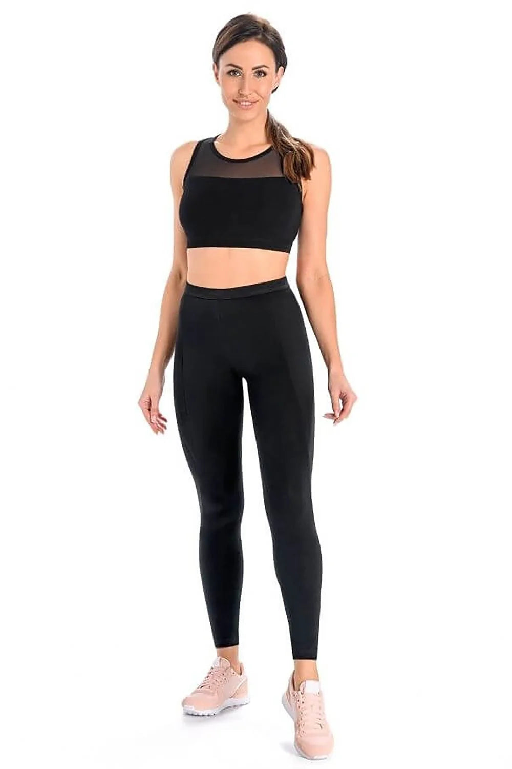 Ensemble sportswear femme haut et leggings taille haute design moderne matières techniques couleur noire élastique confort idéal sport