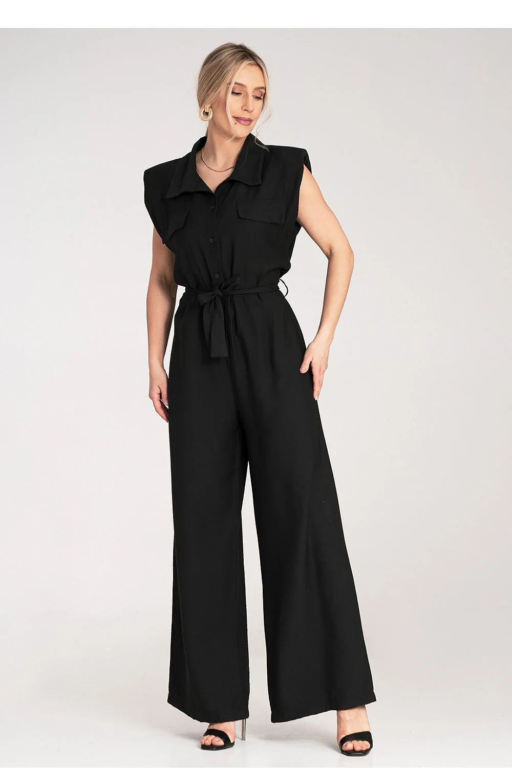Combinaison femme élégante sans manches épaules larges ceinture nouée jambes larges matière légère couleur noire universelle