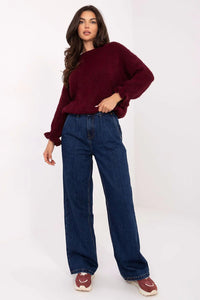 jean femme taille haute denim foncé coupe large jambe ample poches insérées avant ouvertes arrière fermeture glissière bouton