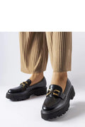 Moccasins Solea cuir noir ornement doré bout en amande semelle épaisse crantée femme élégance moderne versatile