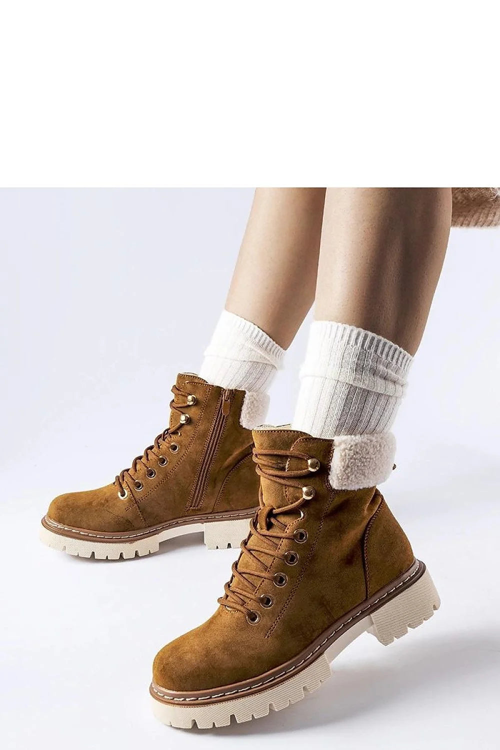Bottes trappeur Solea pour femmes design fonctionnel élégant couleur brun caramel doublure fourrure synthétique semelle caoutchouc durable style casual chic idéales pour l'hiver