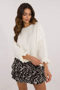 Pull blanc à volants longues manches jupe évasée imprimé zébré noir blanc tenue féminine mode été automne