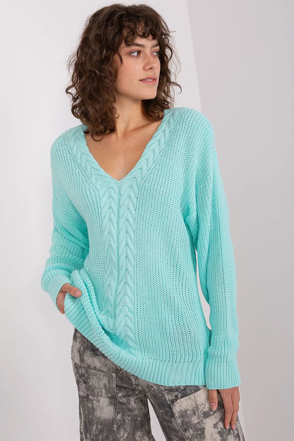 Pull maille femme design twisté turquoise pastel encolure V profond manches longues côtelé casual chic