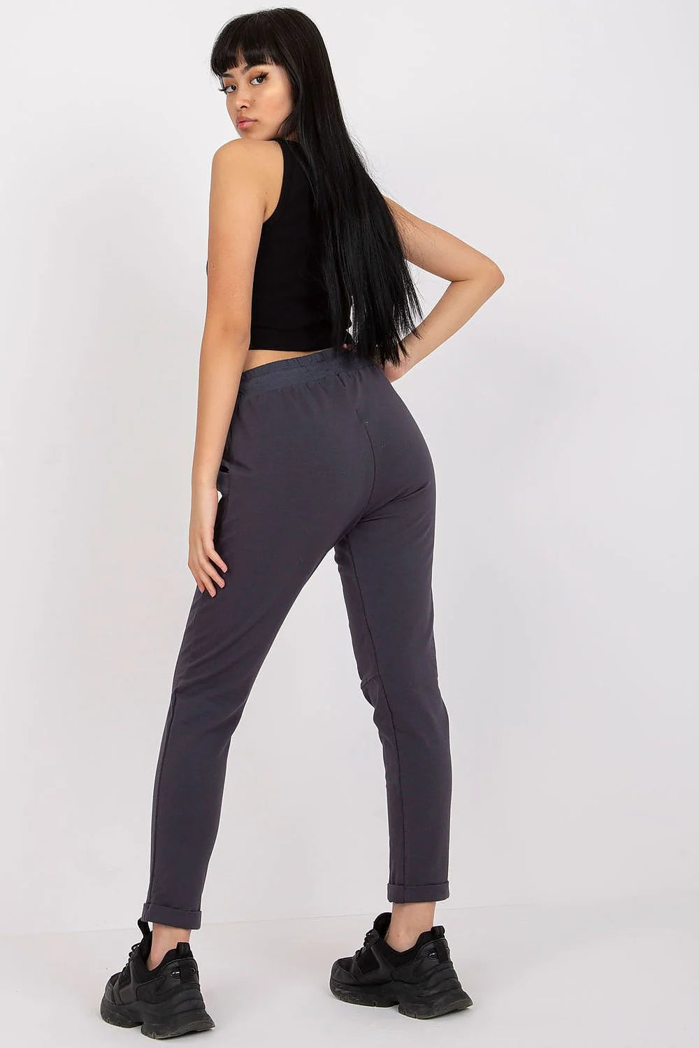 pantalon survêtement femme fuchsia vif taille haute élastique cordon serrage embouts métalliques slim fuselé cheville poches latérales stretch