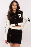Ensemble féminin style sport-chic veste cropped bomber jupe mini noir blanc manches blanches boutons-pression