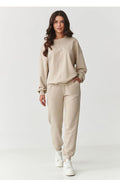 ensemble jogging femme athleisure molleton coton élasthanne beige pierre oversize col rond épaules tombantes broderie tonale taille élastique poches chevilles