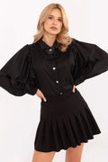blouse manches bouffantes volumineuses boutons métal broche fleur col nœud bijou jupe trapèze courte plis marqués taille haute cintrée sophistiquée