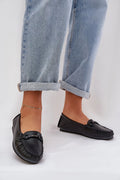 Mocassins pour femmes style classique cuir noir bout arrondi semelle caoutchouc détails métalliques confort toute la journée