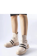 Bottes féminines mode modernes élégantes cuir écologique beige contrastant boucle métallique dorée fermeture éclair fonctionnalité polyvalence femmes