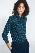 chemise féminine manches longues col classique viscose coupe ajustée pois blancs bleu marine élégant polyvalent bureau casual chic sophistiquée raffinée