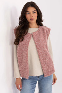 gilet sans manches ouvert maille duveteuse rose poudré bouclé effet mohair longueur hanches poches insérées épaules structurées cocooning