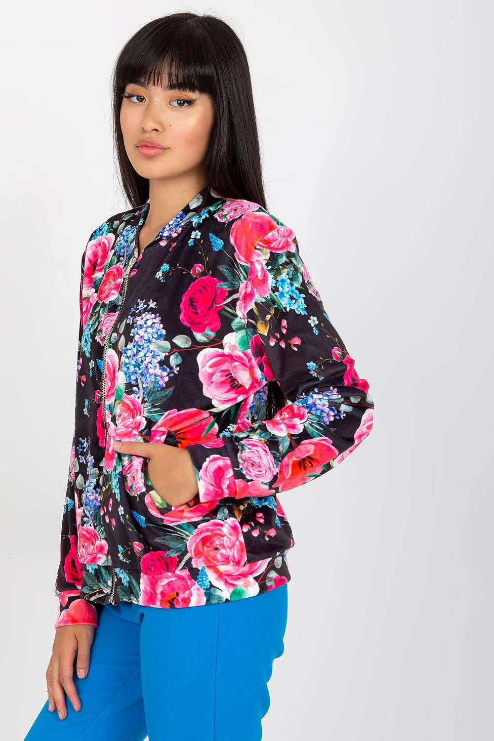 Veste bomber polyester motif floral multicolore fond blanc coupe épurée manches longues poignets élastiques col rond fermeture éclair
